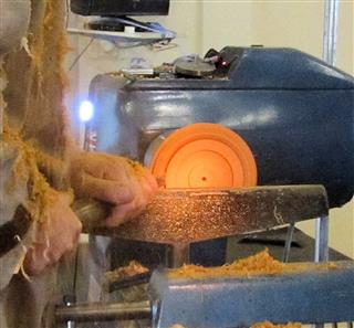 Cutting the core out of the bowl to use for the lid